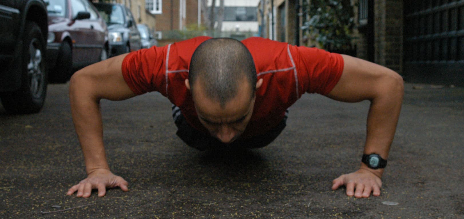 Adrian training with a press-up